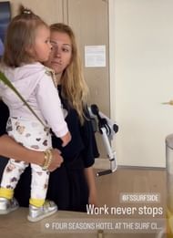 Medvedev's daughter and wife look on as the Russian indulges in a training session